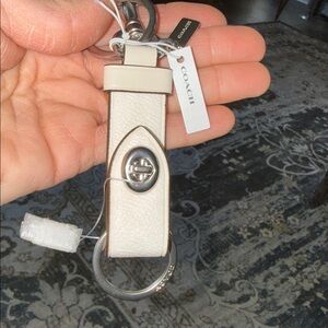 Coach Trigger Lock Chalk Signature Keychain Bag Charm Ivory Leather